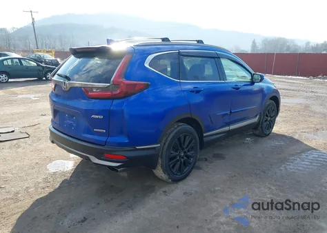 2020 Honda Cr-V Awd Touring z USA, uszkodzony, nr VIN 7FARW2H90LE001423